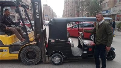 التحفظ على 14 مركبة توك توك وإزالة سور مخالف بالجيزة 